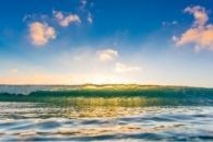 Behind the wave